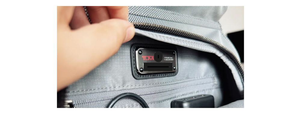 Tumi backpack hides tracking tags for global lost and found services